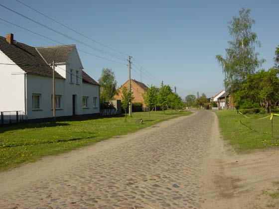 Picture of cobble-stone Dorfstrae in the direction of Dambeck